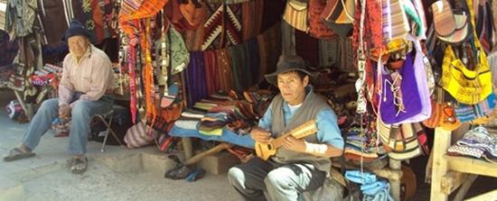 Sucre, Bolivia Travel Photo Memories. Sidewalk Vendor Playing the Charanga