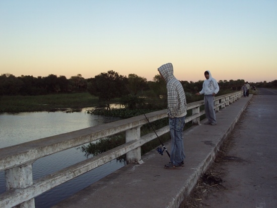 Resistencia & Corrientes Argentina Travel Photo Memories. Taxi Cab Driver from Bus Terminal Stopped So I Could Snap This Photo of Fishing off the Bridge Near Resistencia